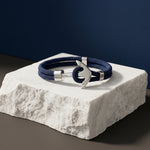 Navy double cord bracelet with polished silver anchor clasp