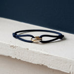 Midnight navy cord bracelet with three interlocking rings