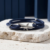 Navy wrapped cord bracelet with polished silver shark clasp