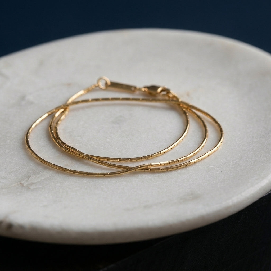 Fine gold chain bracelet with lobster clasp